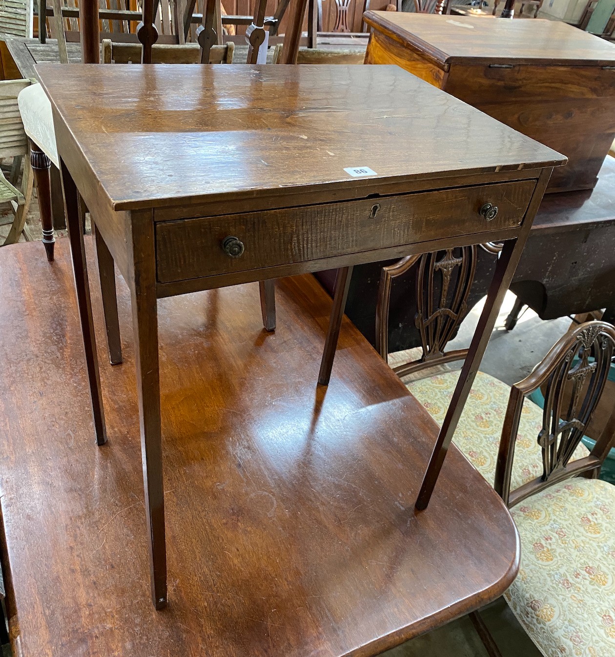 A small George III mahogany side table width 57cm, depth 40cm, height 69cm.